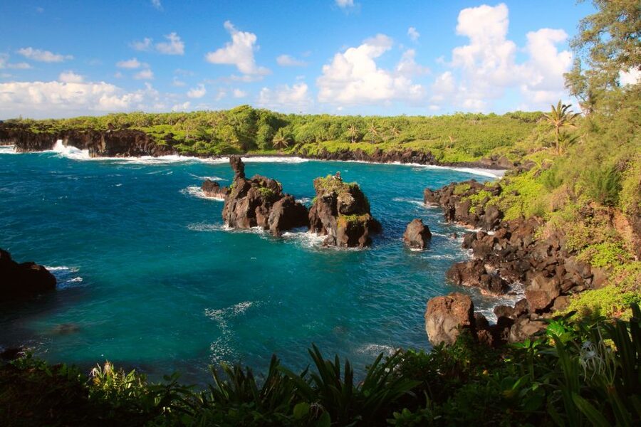 Central Maui: Two-Island Scenic Helicopter Flight to Molokai - Molokai’s sea cliffs and Kahiwa Falls