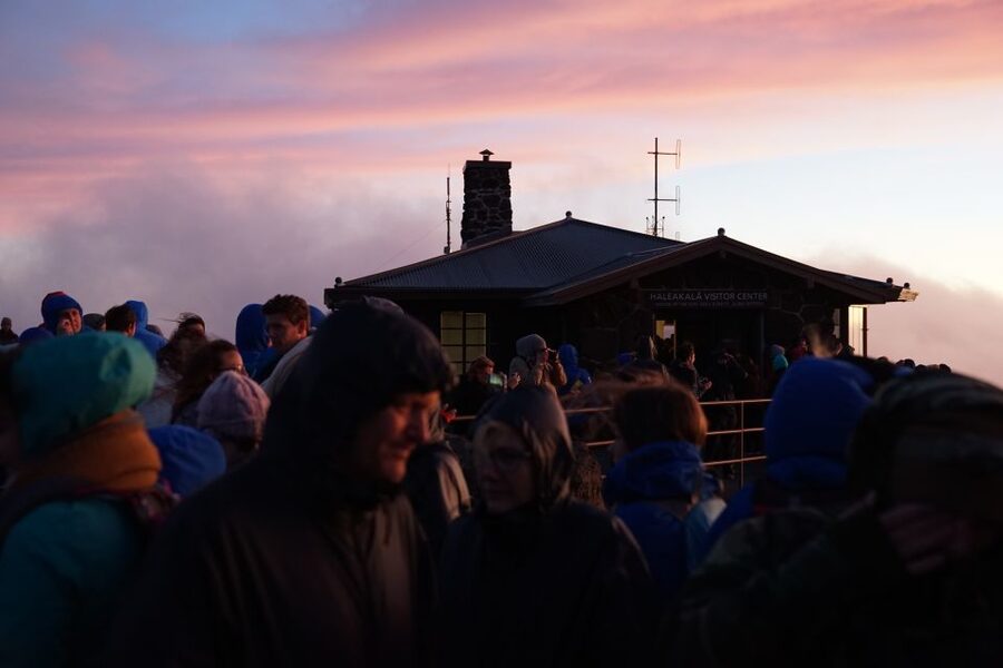 Maui: Sunset & Dinner Tour to Haleakala National Park - Waiting for sunset above the clouds