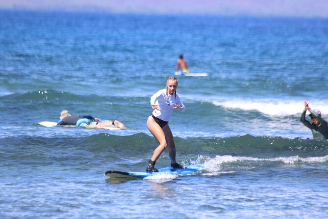Private Surf Lessons in Lahaina, Maui - Getting fitted with a board and rash guard