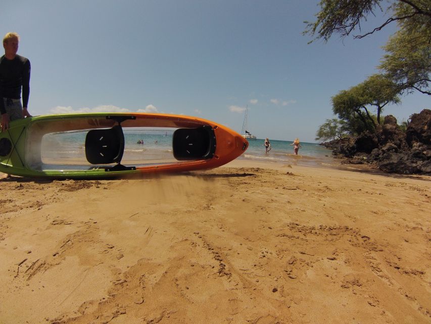 South Maui: Self Guided Clear Bottom Kayak Tour - Entering the water at Makena Landing