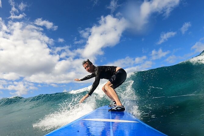 Surf Lesson on Maui - Taking the board into the water