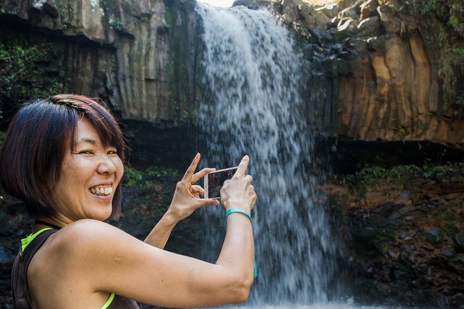 Waterfall & Rainforest Hiking Adventure with Hotel Pickup - Waterfalls, swimming, and a 10-foot jump